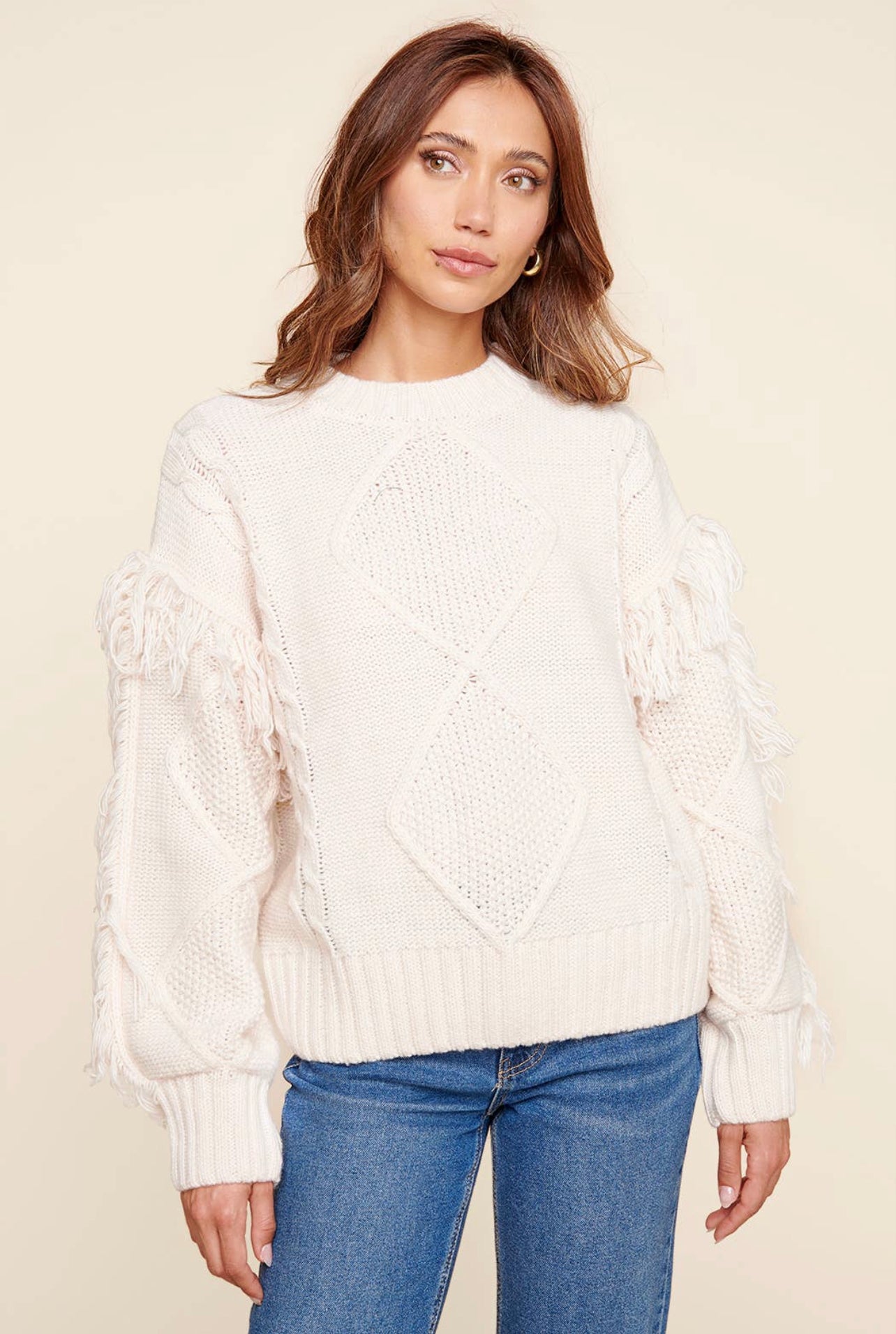 Fringe sleeve cable knit sweater